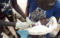 child receiving immunization